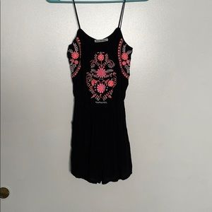 Cute black romper with floral embroidery